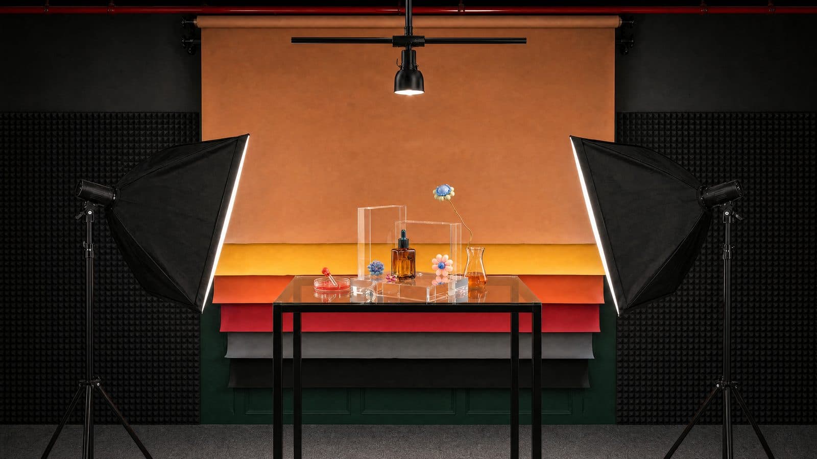 The Product Lab — tabletop product set with coloured paper backdrops